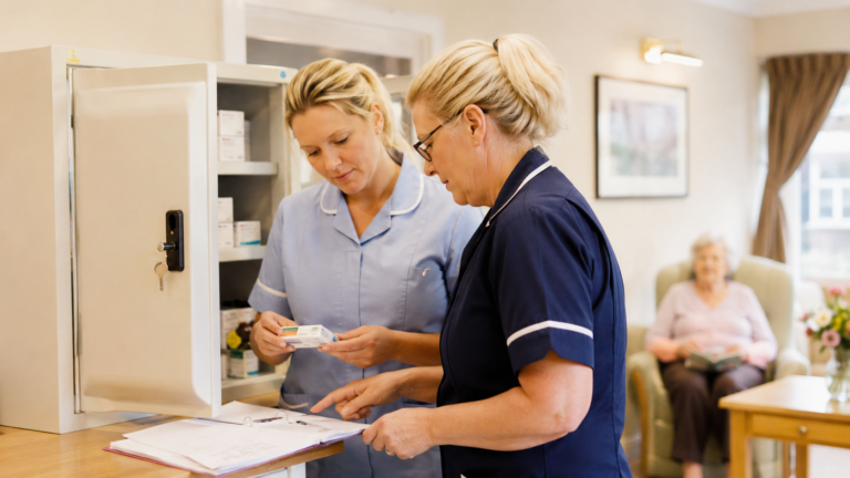 Nurses Reviewing Medication and Care Papers.